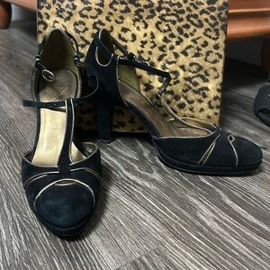 Black and gold Loft heels